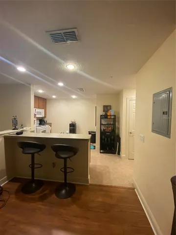 a view of a workspace with furniture