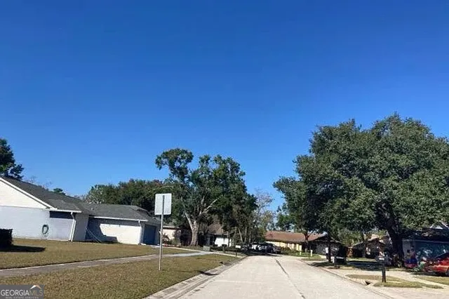 a view of a street in front of a building