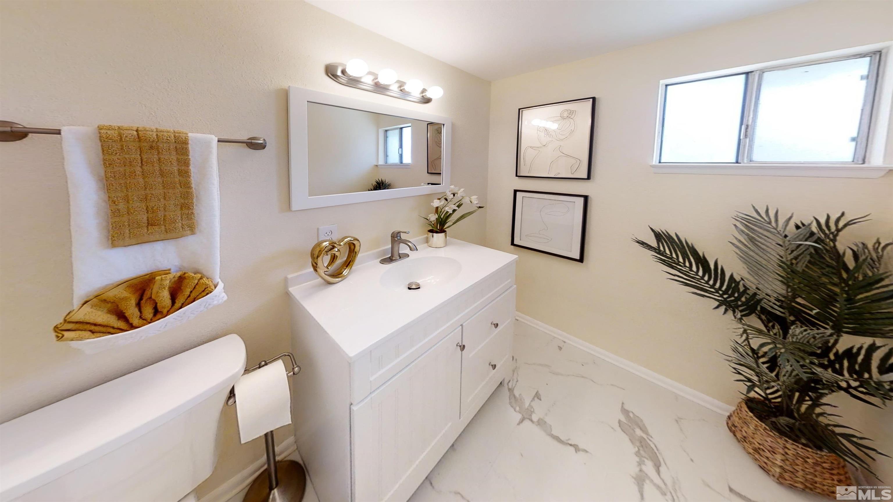 1690 Keystone Avenue Reno, NV 89503 - Photo 13 of 18 a utility room with a window dryer and washer