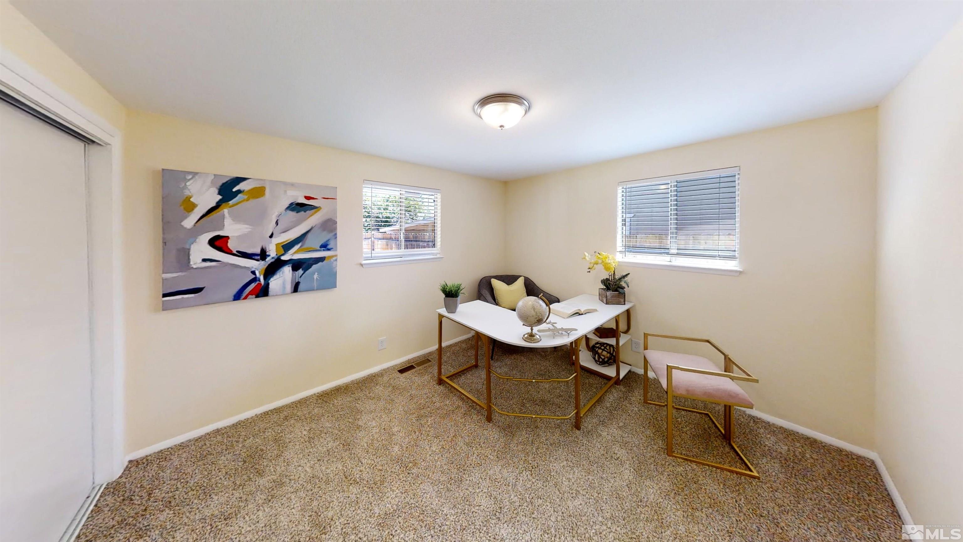 1690 Keystone Avenue Reno, NV 89503 - Photo 6 of 18 a living room with furniture and a window