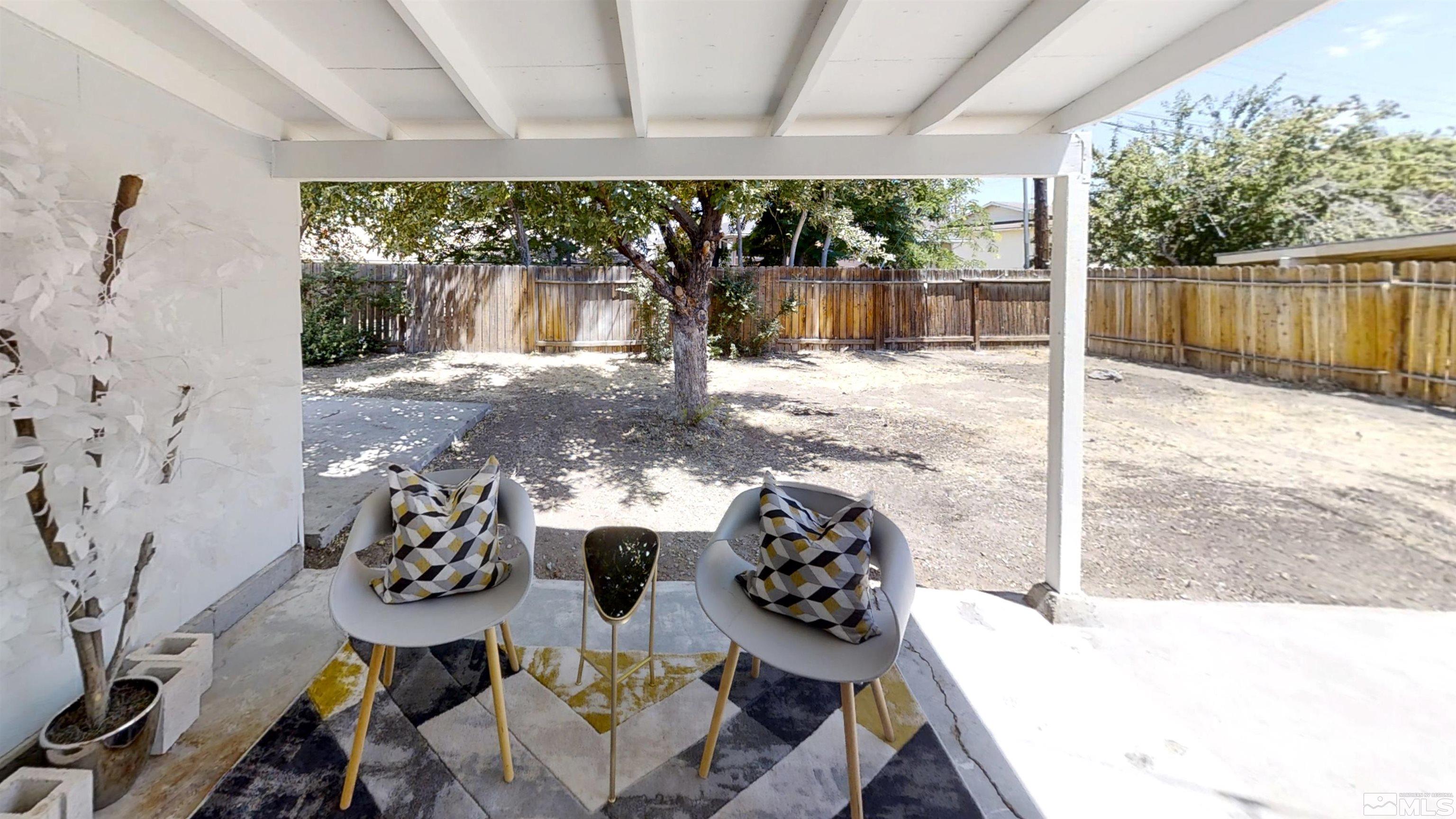 1690 Keystone Avenue Reno, NV 89503 - Photo 7 of 18 a view of a porch with furniture and a yard