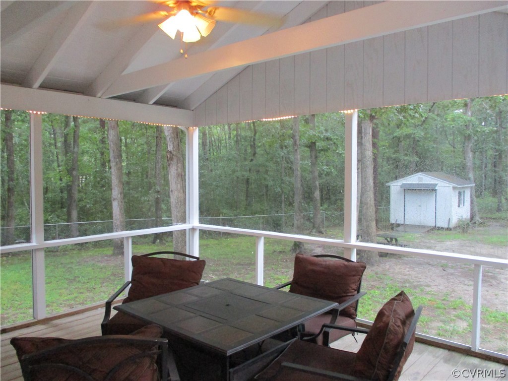12630 2nd Branch Road Chesterfield, VA 23838 - Photo 21 of 23 Rear Screened in Porch with Ceiling Fan,Park Like