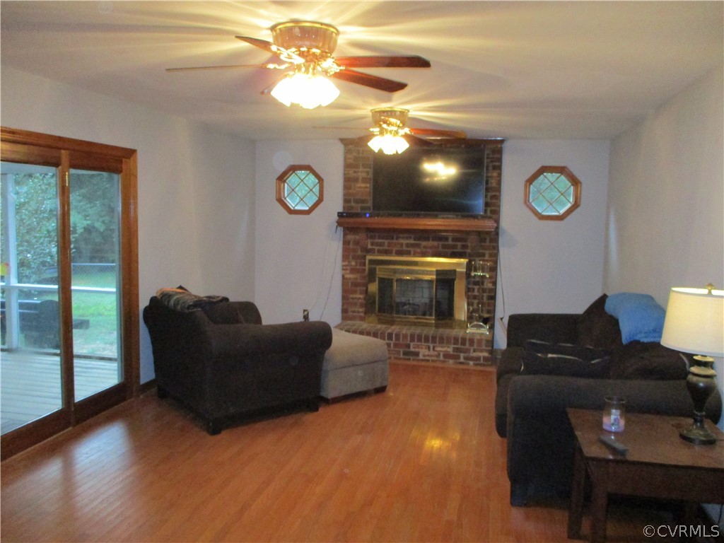 12630 2nd Branch Road Chesterfield, VA 23838 - Photo 7 of 23 Family Room which exits to screened porch