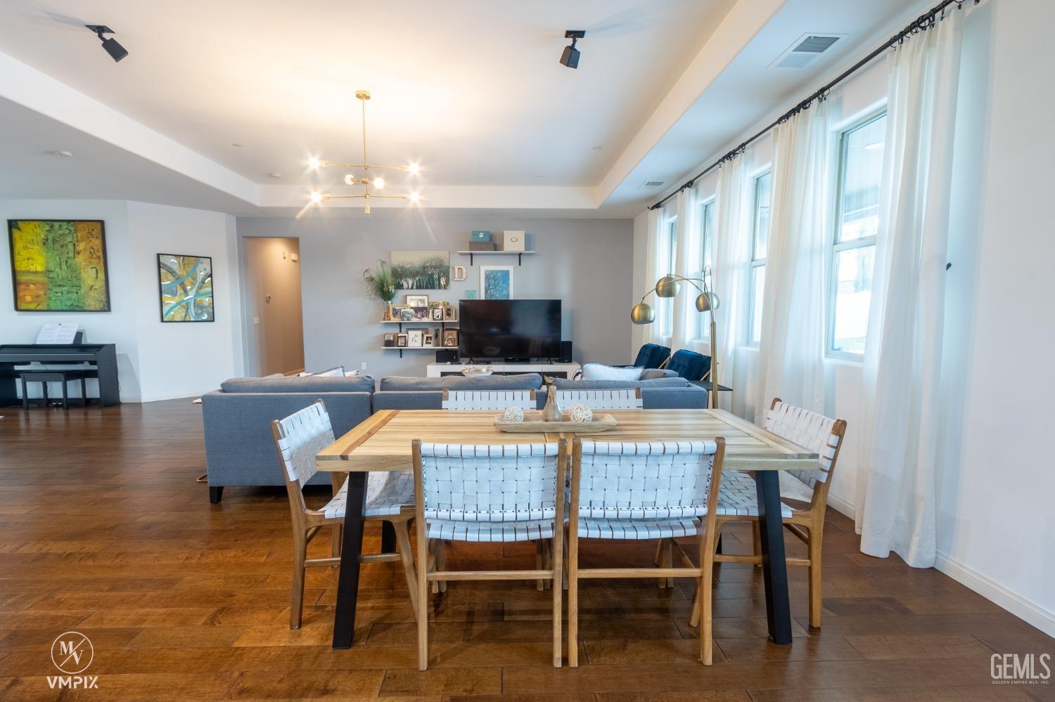 Undisclosed Address Bakersfield, CA 93311 - Photo 14 of 55 a view of a dining room with furniture