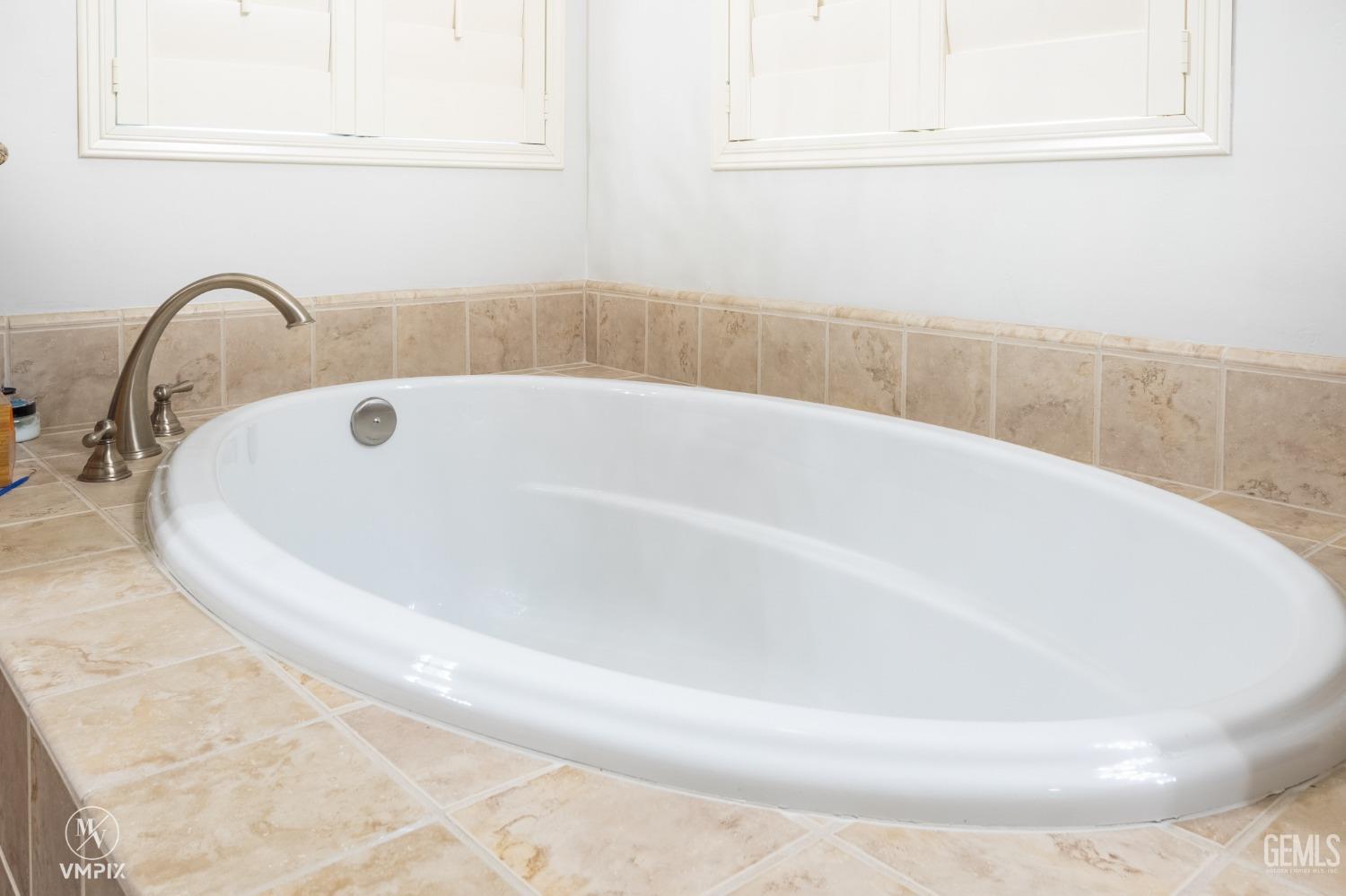 Undisclosed Address Bakersfield, CA 93311 - Photo 37 of 55 a close view of a bathtub in a bathroom