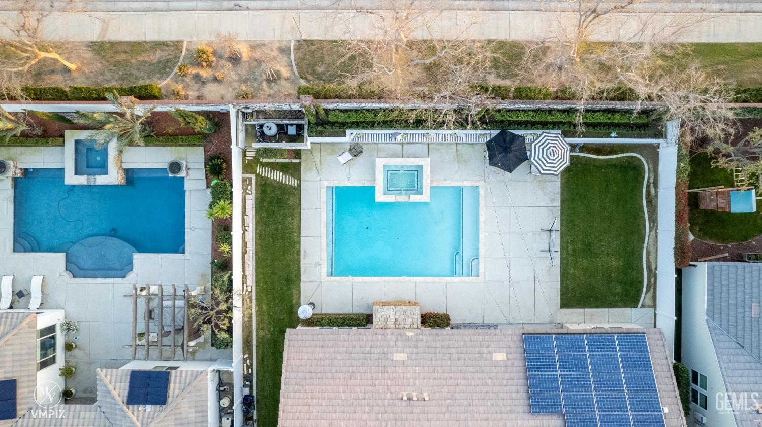 Undisclosed Address Bakersfield, CA 93311 - Photo 50 of 55 a view of a house with a backyard