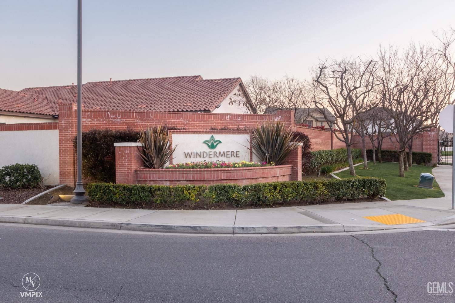 Undisclosed Address Bakersfield, CA 93311 - Photo 6 of 55 a view of a house with a yard and potted plants