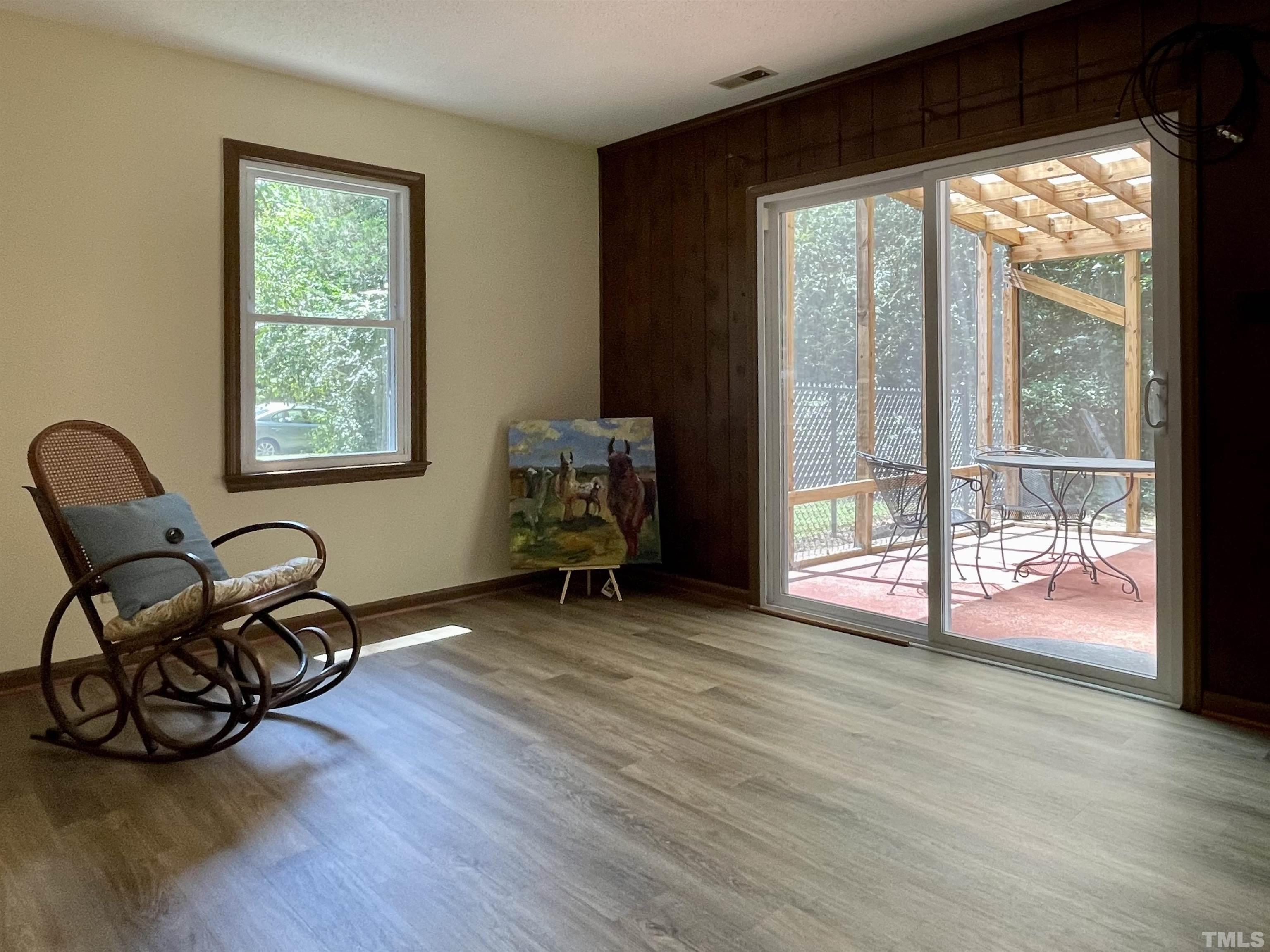 4506 Malvern Road Durham, NC 27707 - Photo 35 of 40 The lower level family room runs the entire width of the house. The shown space could be a separate sitting area or game center. Sliders lead to covered/screened patio.