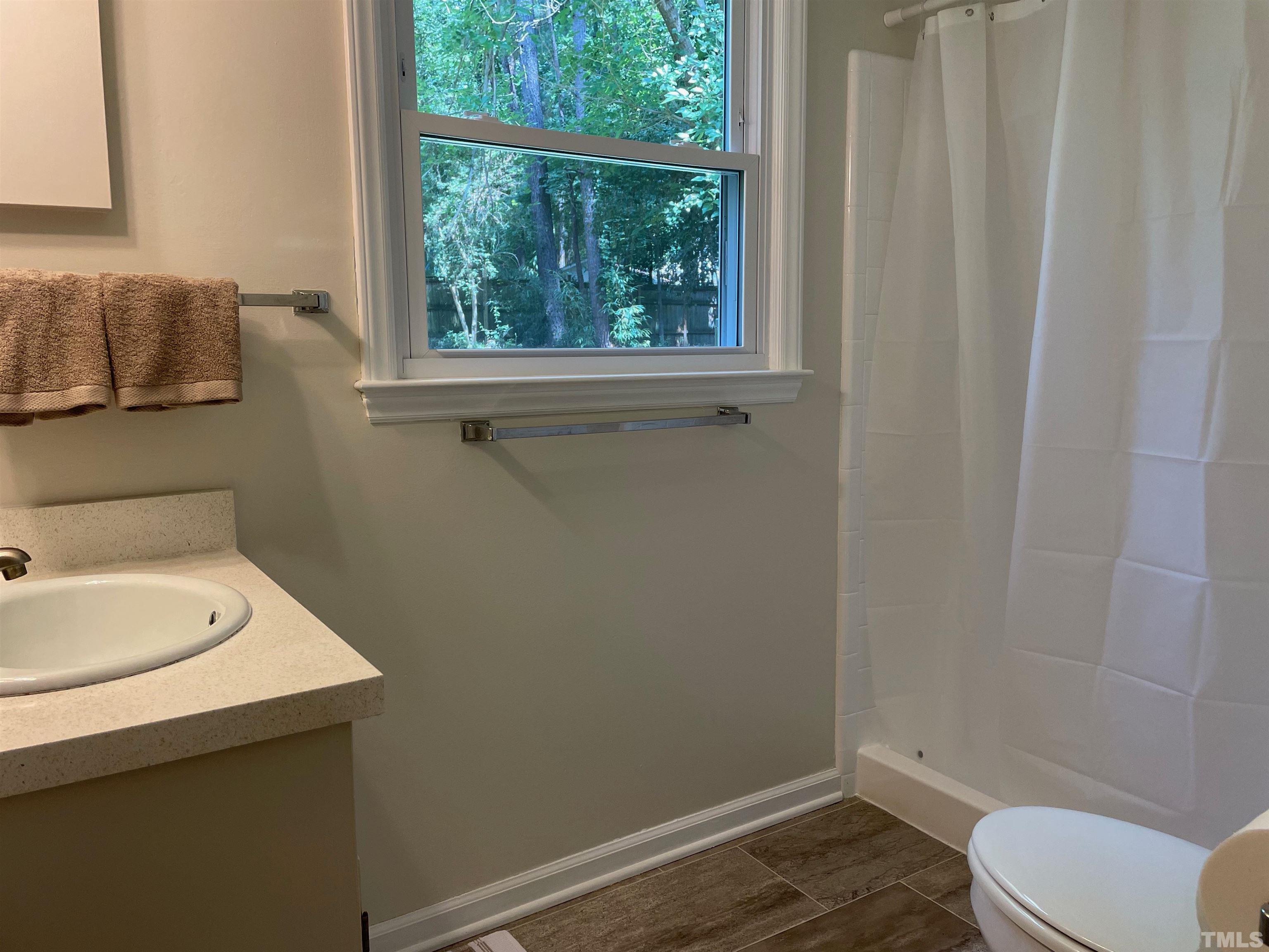 4506 Malvern Road Durham, NC 27707 - Photo 36 of 40 Third full bathroom is on lower level.