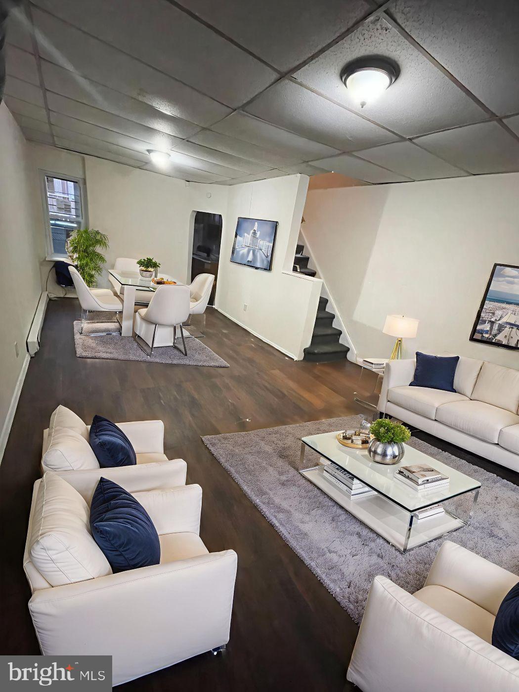 3432 Ormes Street Philadelphia, PA 19134 - Photo 1 of 10 a living room with furniture and white walls