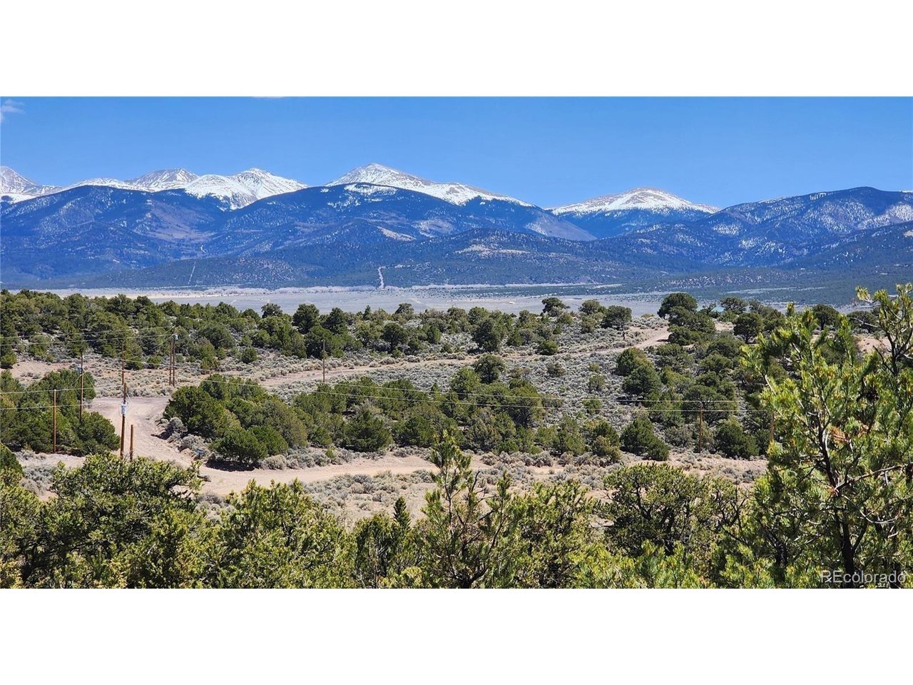48 Erin The Red Road San Luis, CO 81152 - Photo 3 of 6 a picture of a city and mountain view