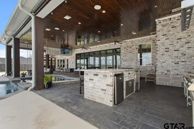 a kitchen with a stove and cabinets