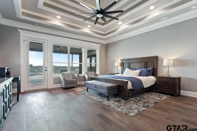 a bedroom with a bed and a couch