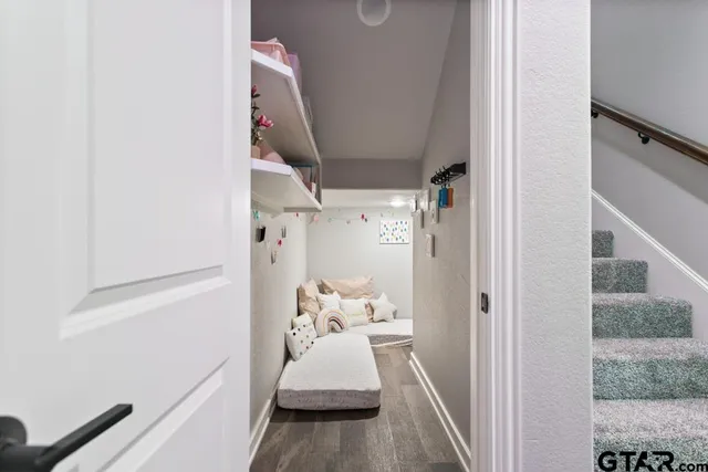 a bathroom with a toilet and a sink
