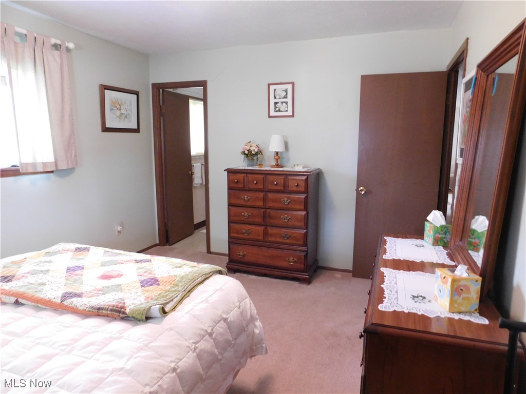 9255 Root Road North Ridgeville, OH 44039 - Photo 23 of 46 Bedroom with light carpet