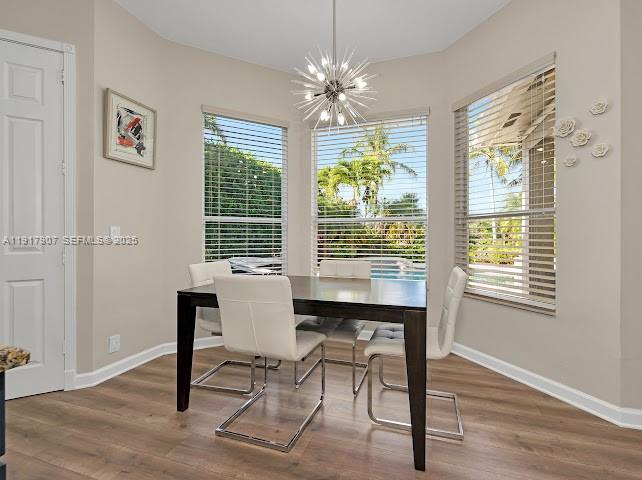 585 Southwest Yacht Basin Way Stuart, FL 34997 - Photo 33 of 61 a view of a room with a window and wooden floor