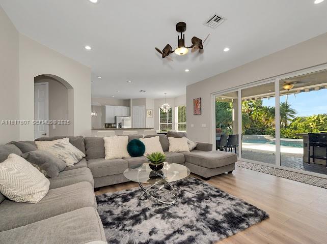 585 Southwest Yacht Basin Way Stuart, FL 34997 - Photo 37 of 61 a living room with furniture and a large window