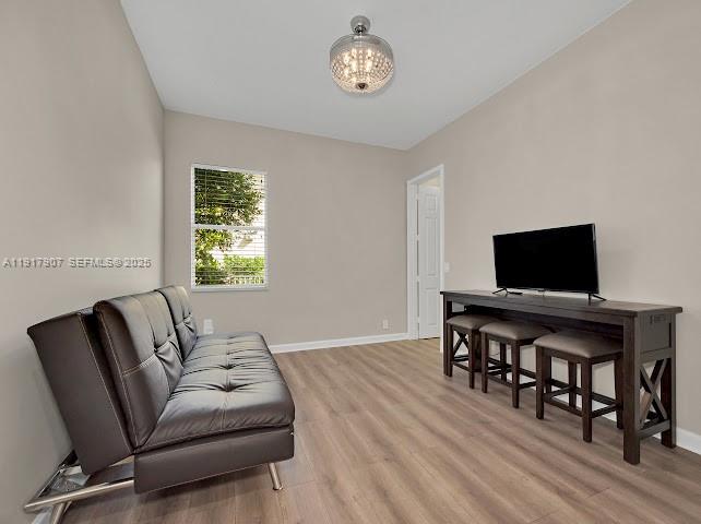 585 Southwest Yacht Basin Way Stuart, FL 34997 - Photo 39 of 61 a living room with furniture and a flat screen tv
