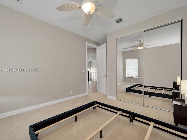 585 Southwest Yacht Basin Way Stuart, FL 34997 - Photo 44 of 61 a room with gym equipment and a large window