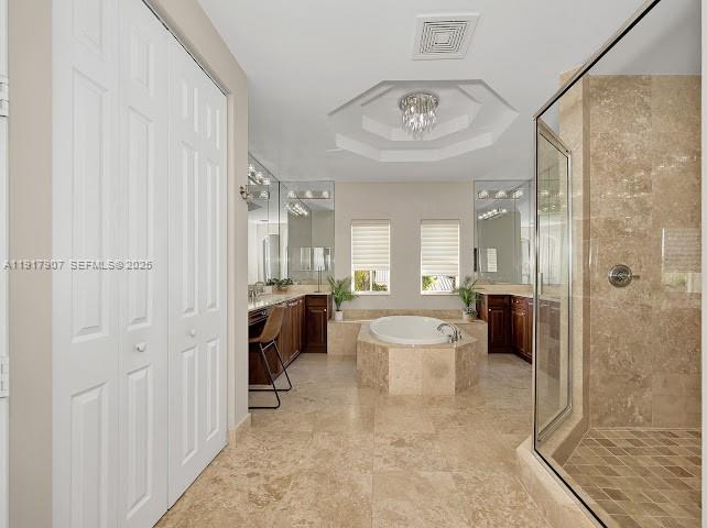 585 Southwest Yacht Basin Way Stuart, FL 34997 - Photo 55 of 61 a large bathroom with a toilet a sink a mirror and a shower