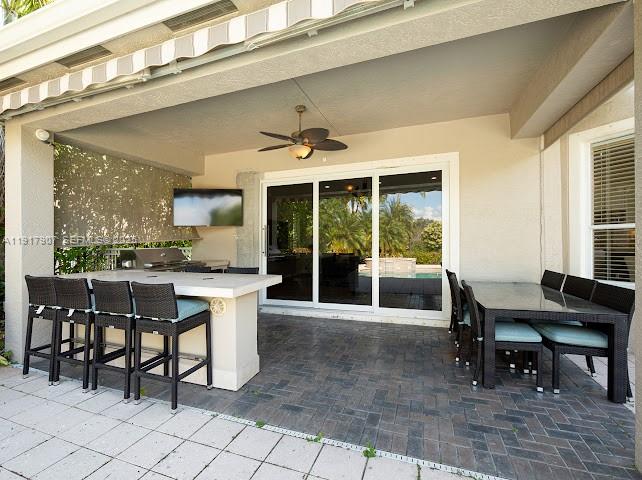585 Southwest Yacht Basin Way Stuart, FL 34997 - Photo 57 of 61 a view of a dining room with furniture window and outside view