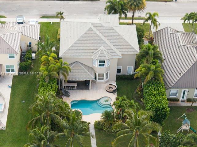 585 Southwest Yacht Basin Way Stuart, FL 34997 - Photo 7 of 61 an aerial view of a house with yard