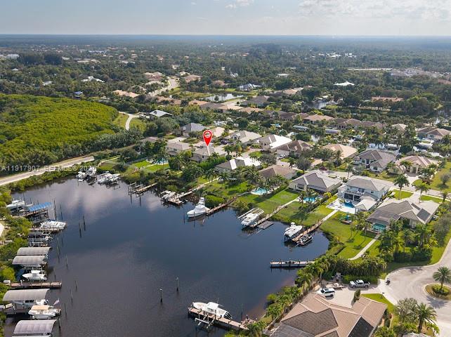 585 Southwest Yacht Basin Way Stuart, FL 34997 - Photo 8 of 61 an aerial view of residential houses with outdoor space and lake view