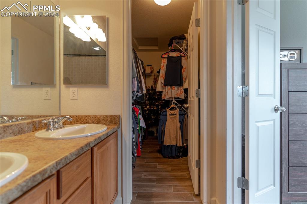 1166 Walters Point Monument, CO 80132 - Photo 12 of 21 a bathroom with a sink and a mirror