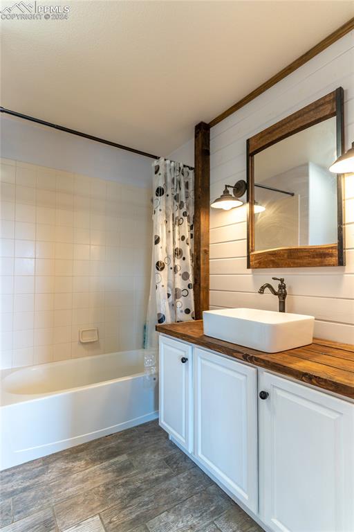 1166 Walters Point Monument, CO 80132 - Photo 16 of 21 a bathroom with a bathtub and a sink