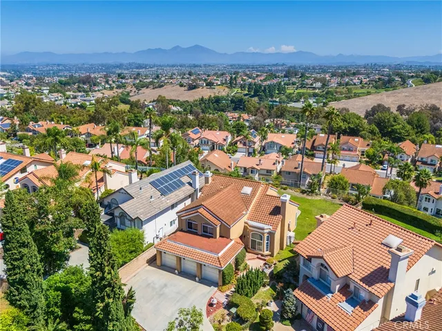 a view of a chairs and table in the patio