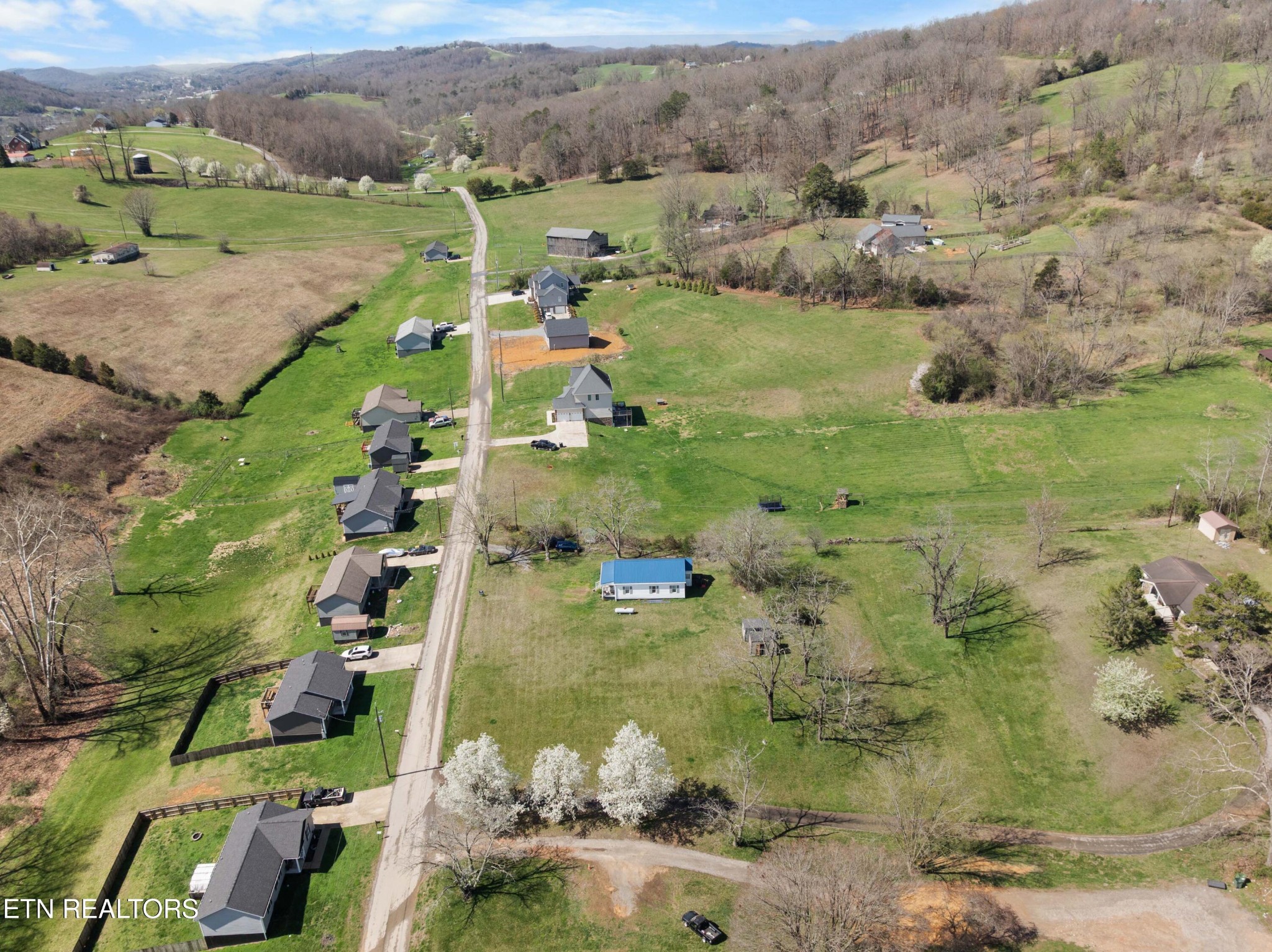 385 Hubbs Grove Road Maynardville, TN 37807 - Photo 30 of 33 a view of lake with residential houses with outdoor space