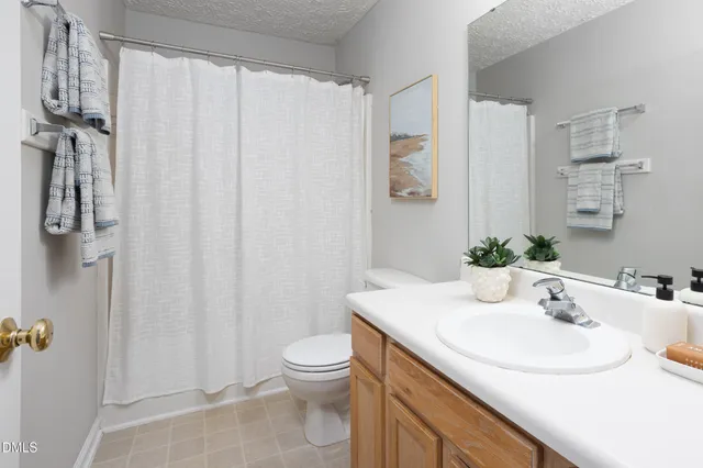 a view of a swimming pool with an outdoor space and seating area