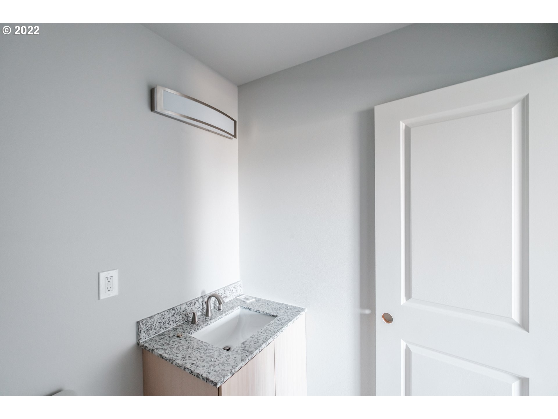 1671 Cooper Street Lebanon, OR 97355 - Photo 14 of 32 a bathroom with a granite countertop sink and a mirror