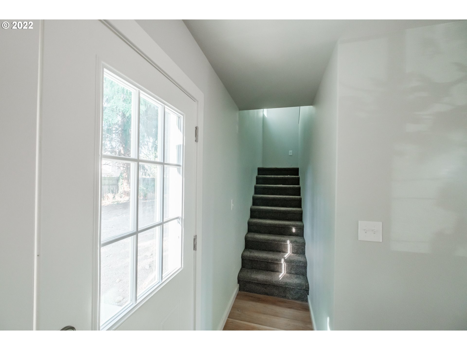 1671 Cooper Street Lebanon, OR 97355 - Photo 21 of 32 a view of entryway and hall with wooden floor