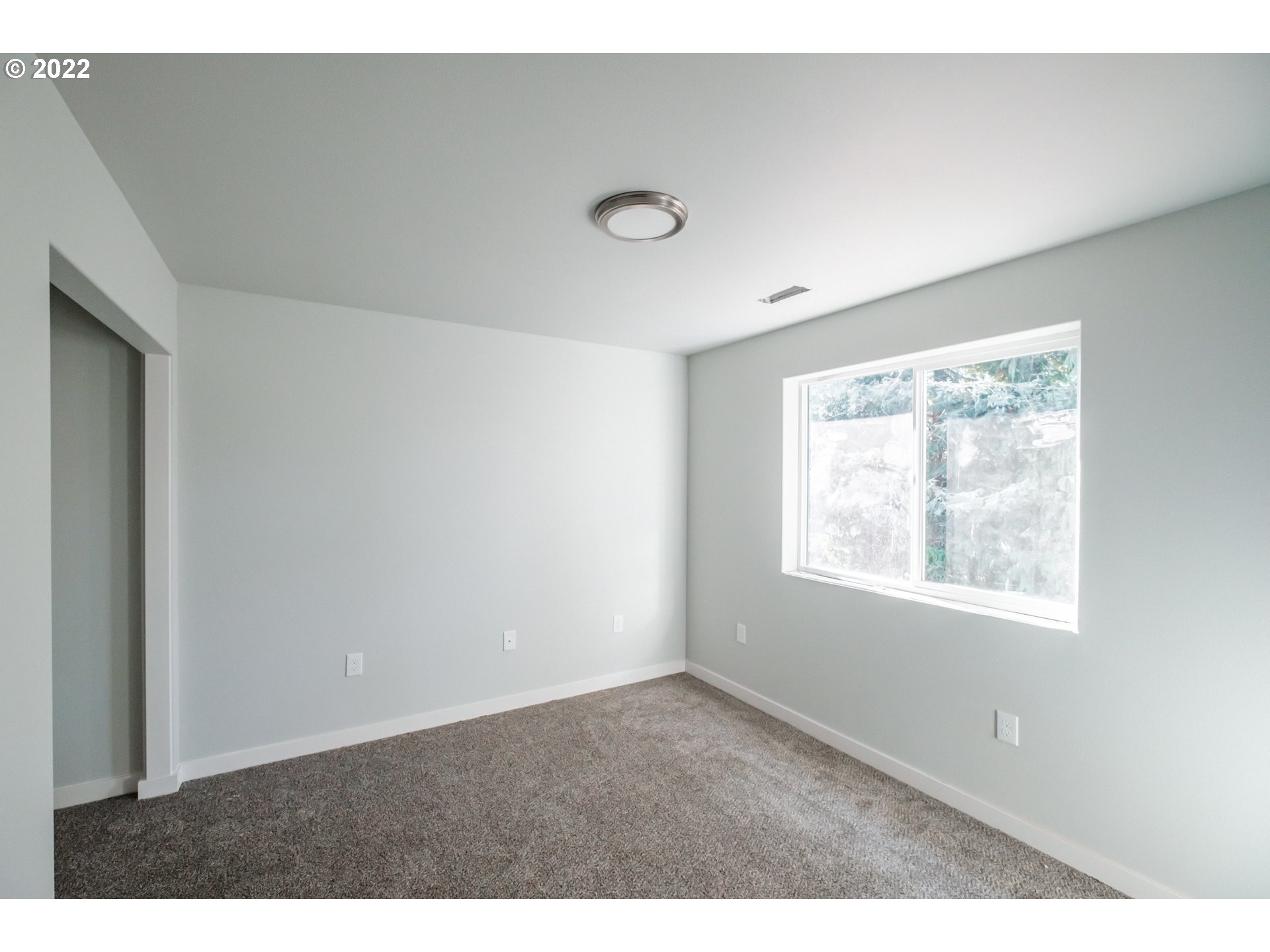 1671 Cooper Street Lebanon, OR 97355 - Photo 22 of 32 a view of an empty room with a window