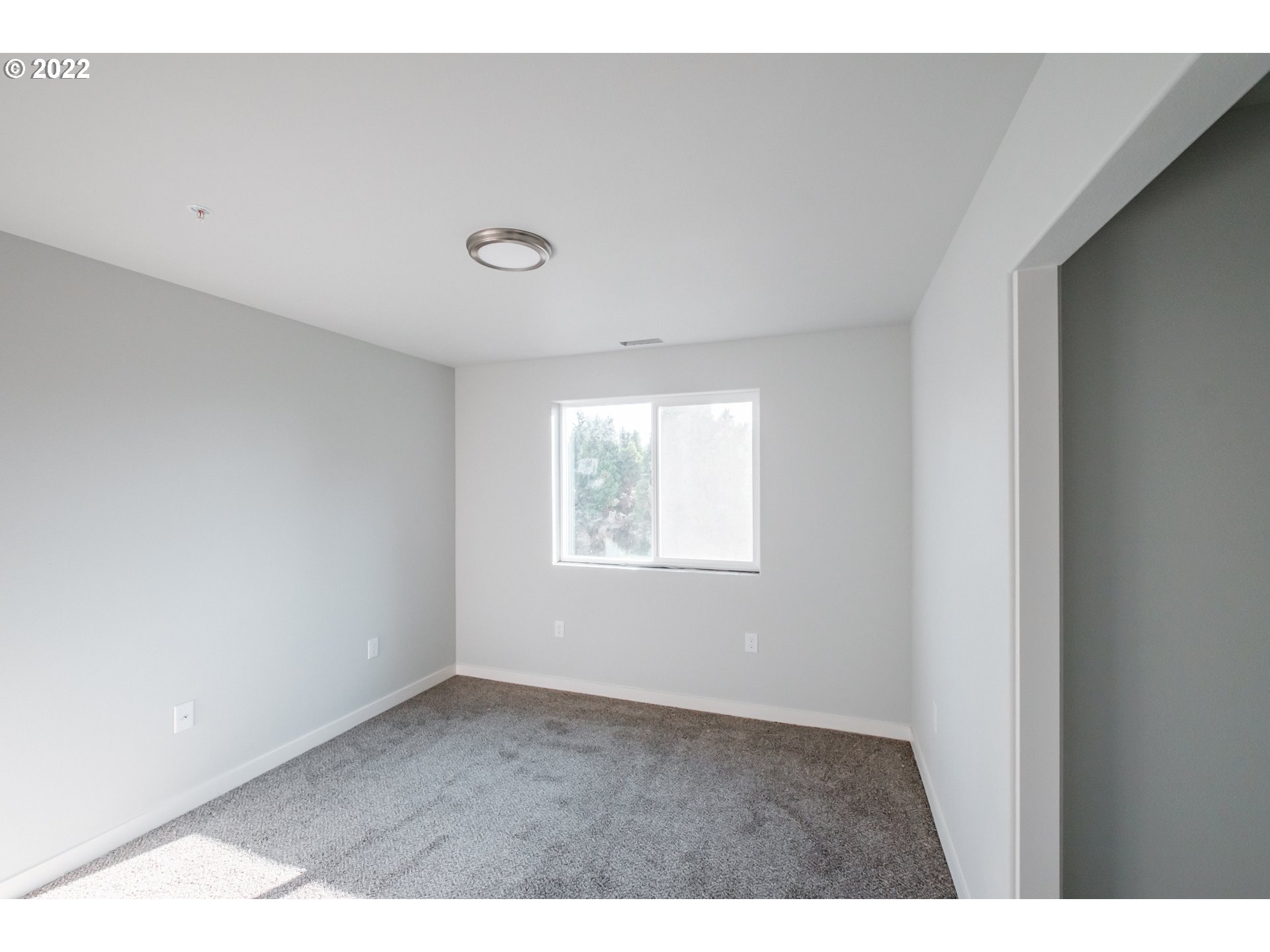 1671 Cooper Street Lebanon, OR 97355 - Photo 24 of 32 a view of an empty room with a window