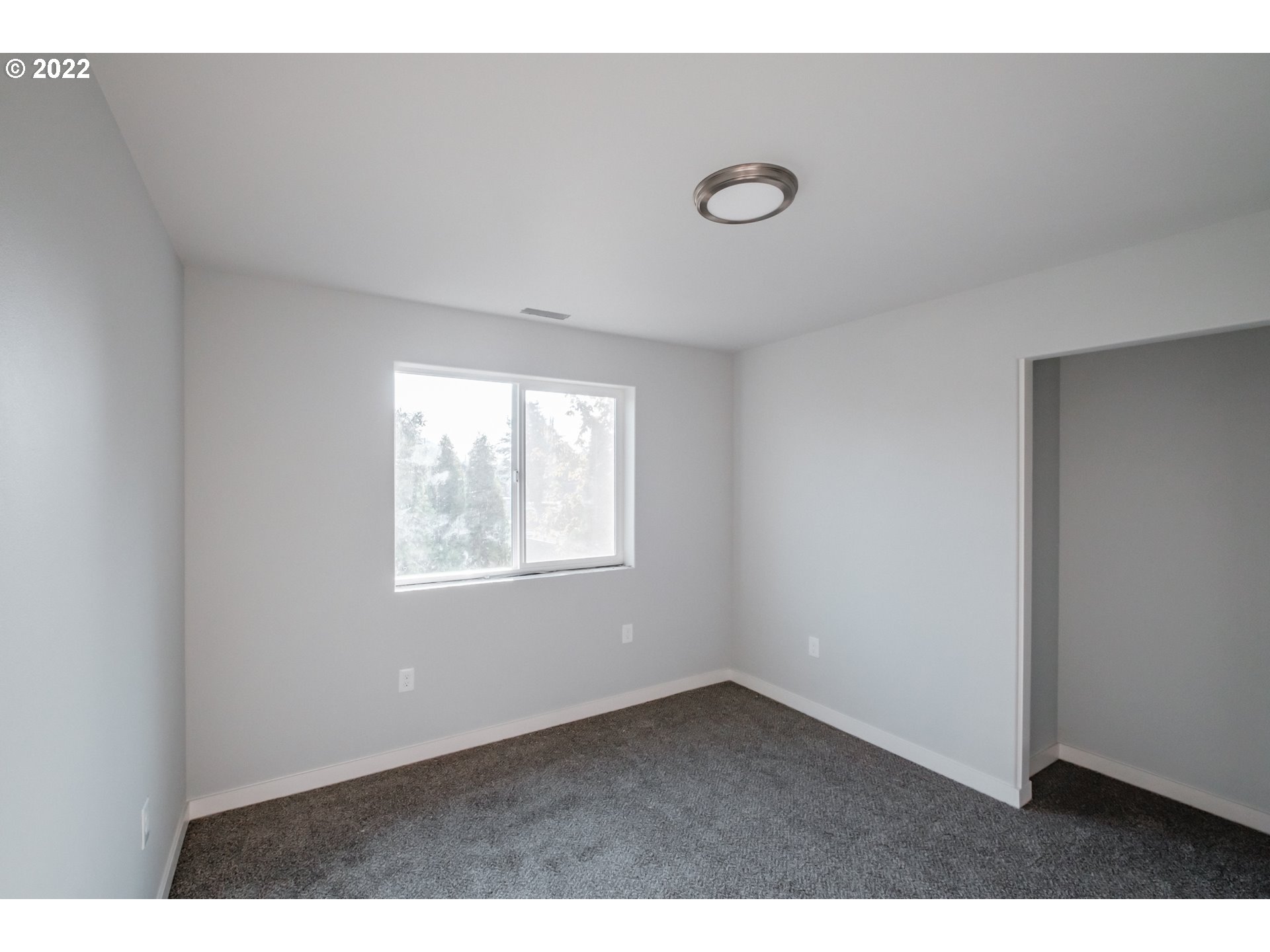 1671 Cooper Street Lebanon, OR 97355 - Photo 25 of 32 a view of an empty room with a window