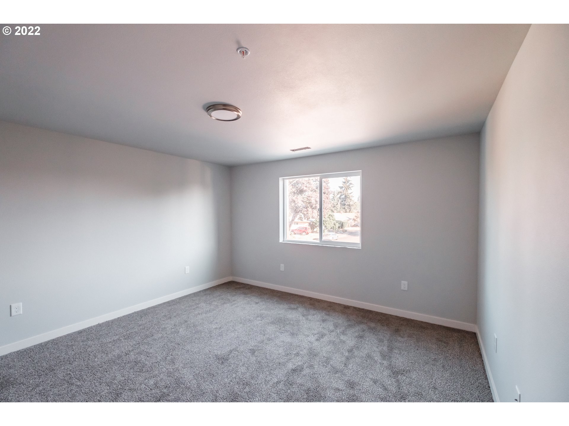 1671 Cooper Street Lebanon, OR 97355 - Photo 26 of 32 a view of an empty room with a window