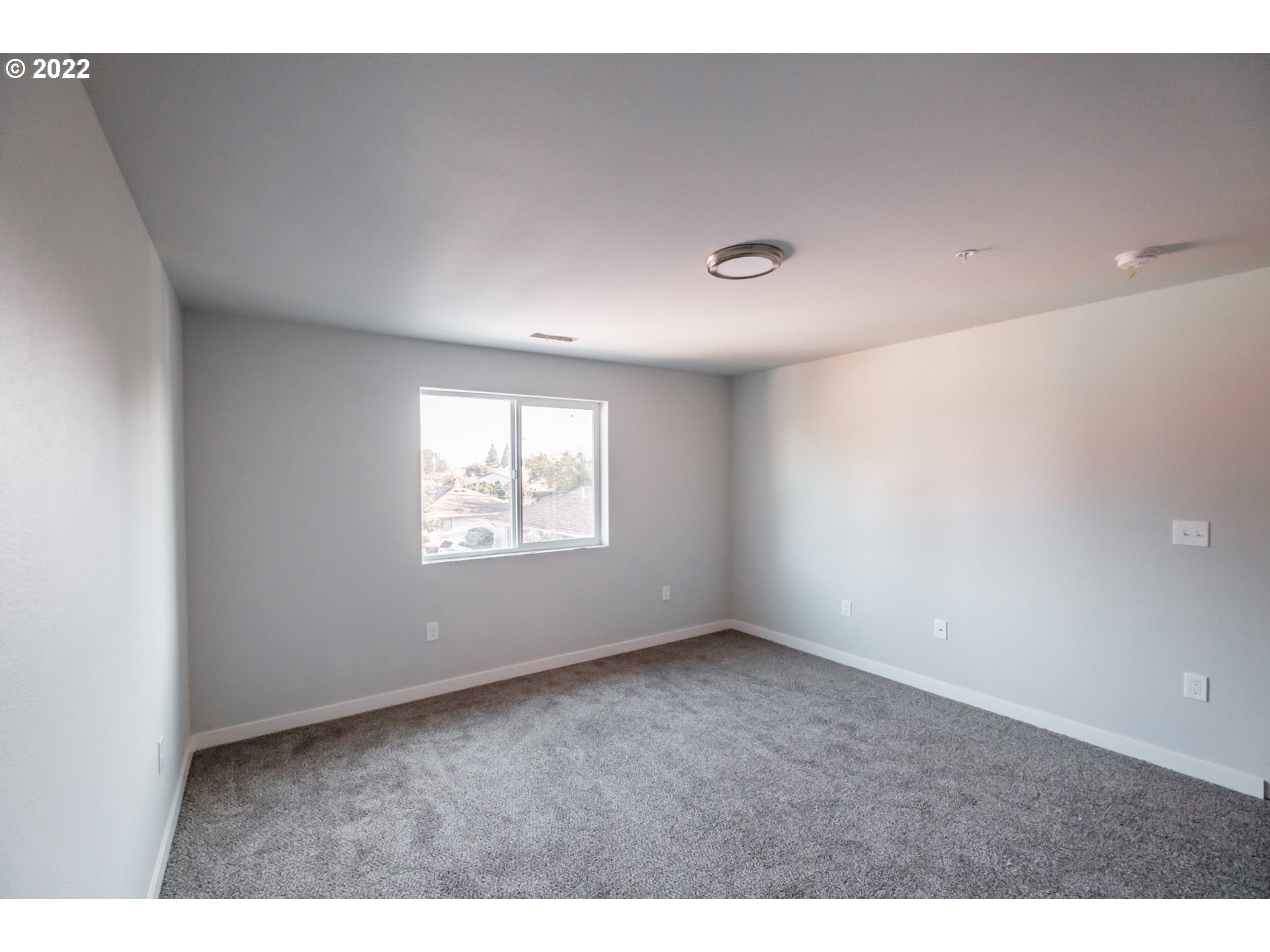1671 Cooper Street Lebanon, OR 97355 - Photo 27 of 32 a view of an empty room with a window