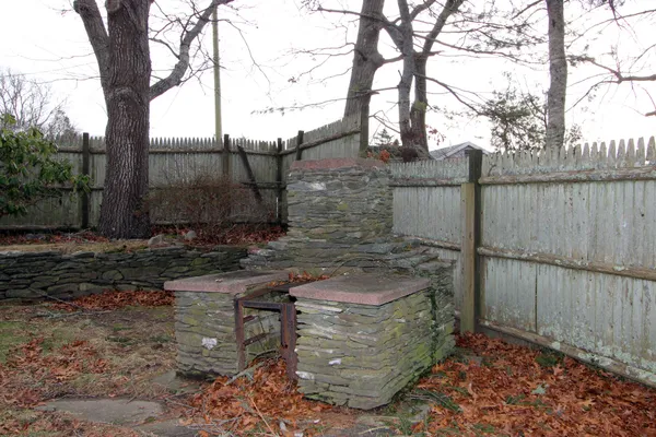 a view of a backyard of the house