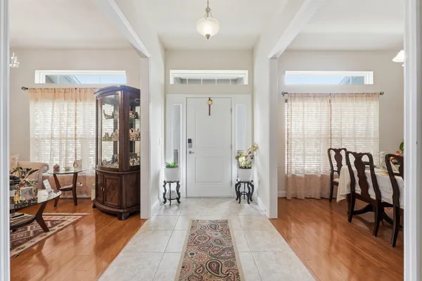 a view of a livingroom with furniture and windows