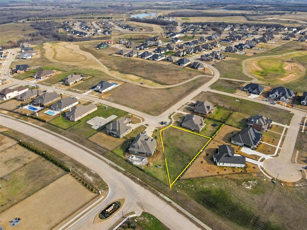 1701 Eagle Glen Pass Gunter, TX 75058 - Photo 2 of 10 an aerial view of residential houses with outdoor space