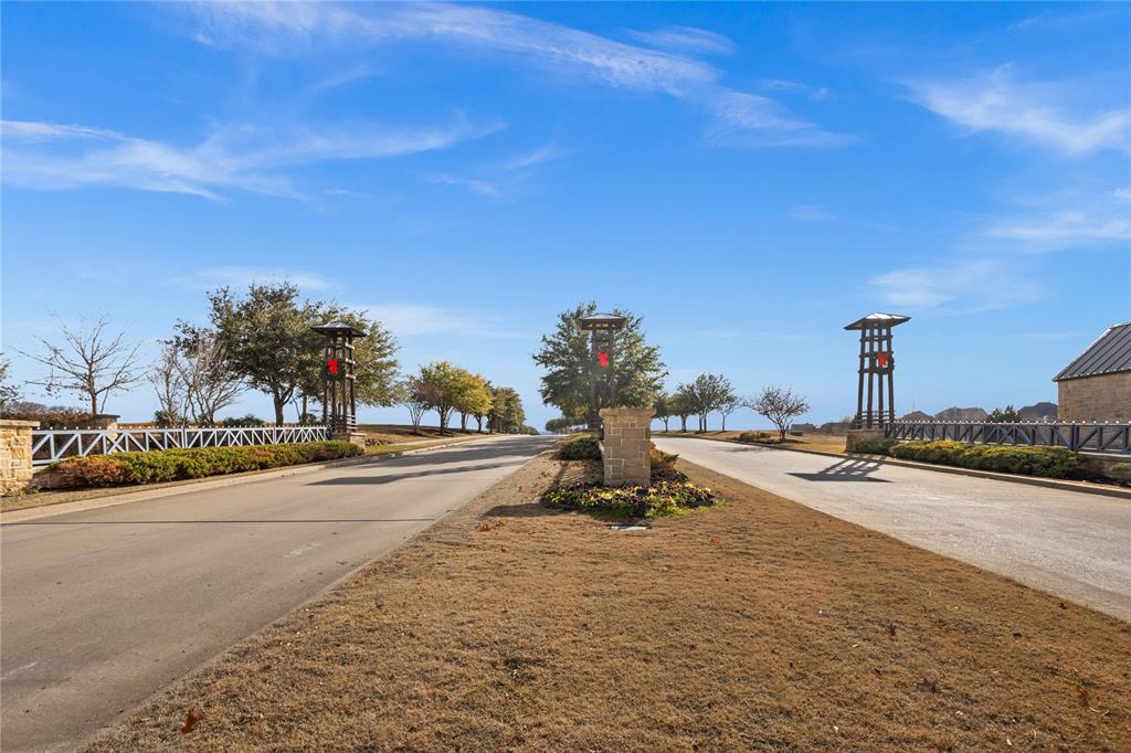 1701 Eagle Glen Pass Gunter, TX 75058 - Photo 3 of 10 a view of a swimming pool with an outdoor space and seating area