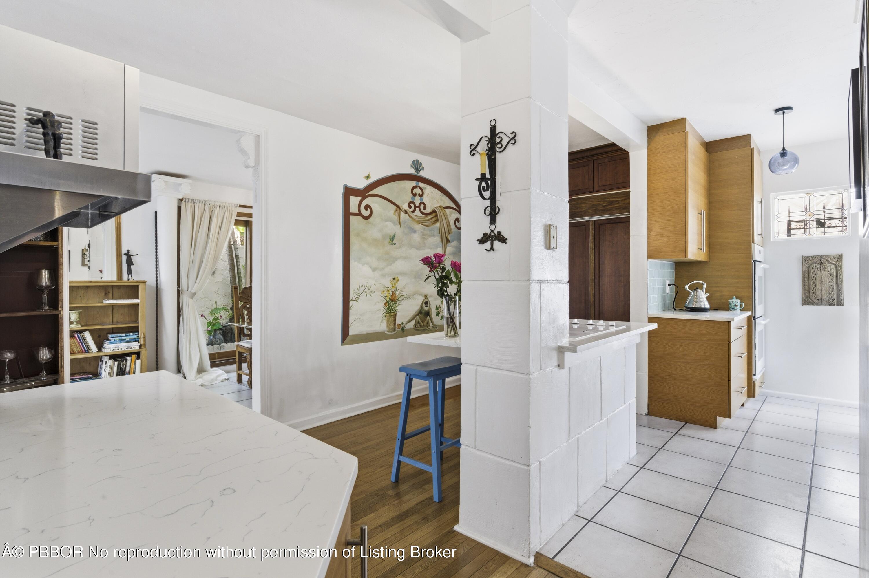 281 Granada Road West Palm Beach, FL 33401 - Photo 19 of 19 a bed room with a bed and a refrigerator