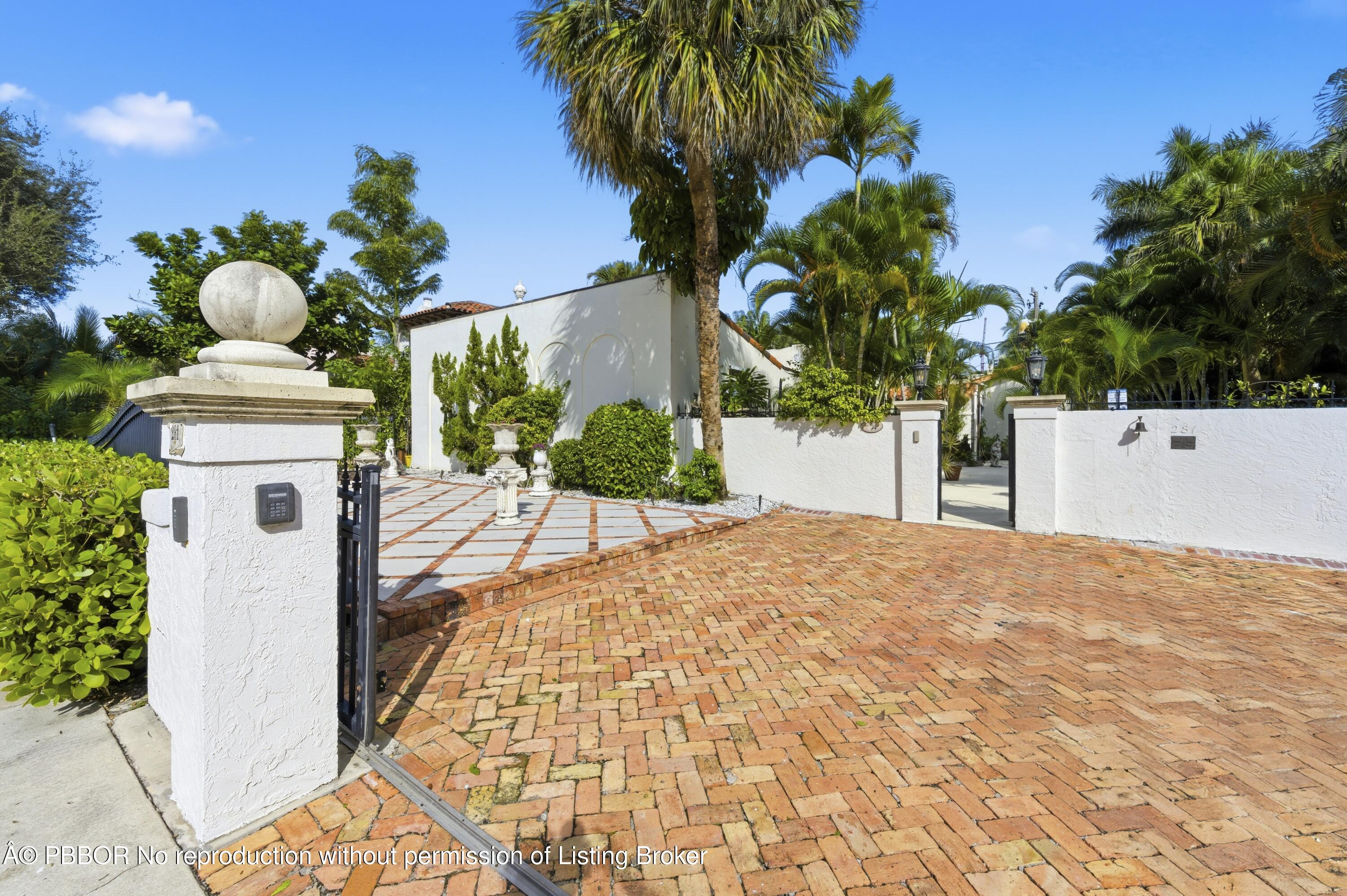 281 Granada Road West Palm Beach, FL 33401 - Photo 2 of 19 a view of entryway and hall with wooden floor
