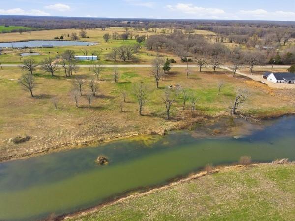 Lot 6 Fm 900 Saltillo, TX 75478 - Photo 1 of 15 a view of an ocean