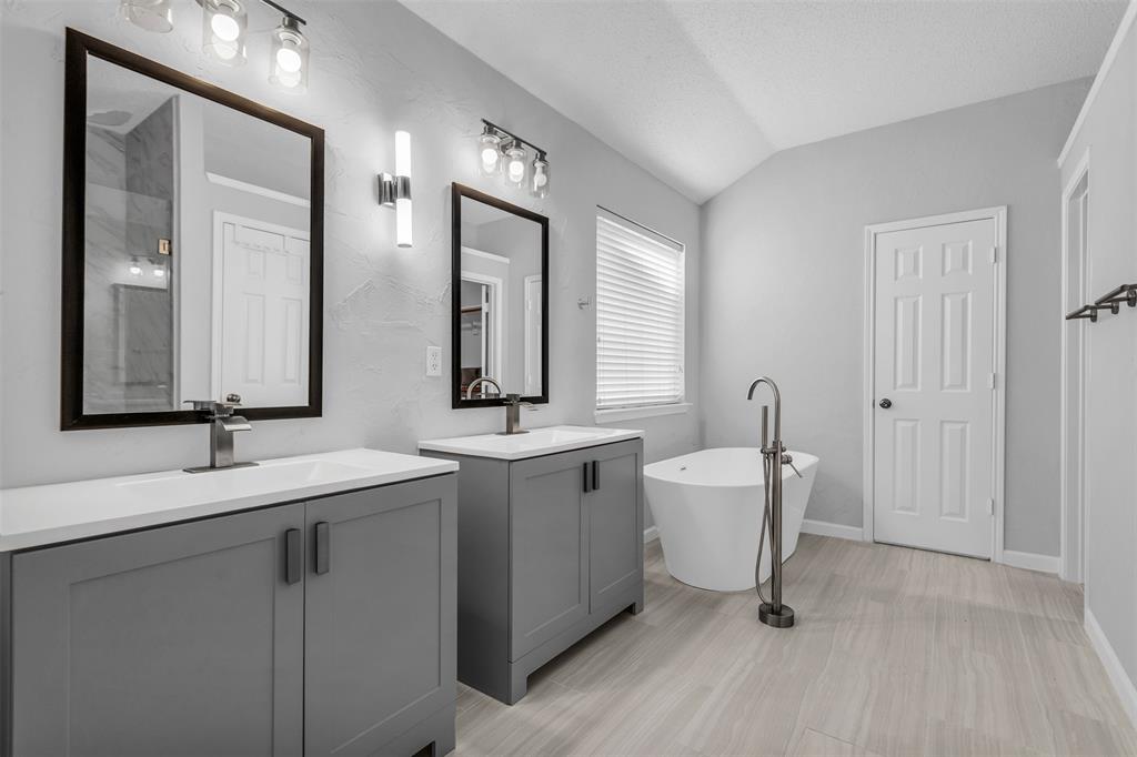 308 Glen Ridge Drive Murphy, TX 75094 - Photo 20 of 36 a bathroom with a double vanity sink mirror and toilet