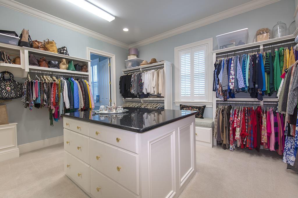 3610 Trimble Road Nashville, TN 37215 - Photo 14 of 29 Master Bedroom Closet features a storage island with granite packing countertop and a secondary closet