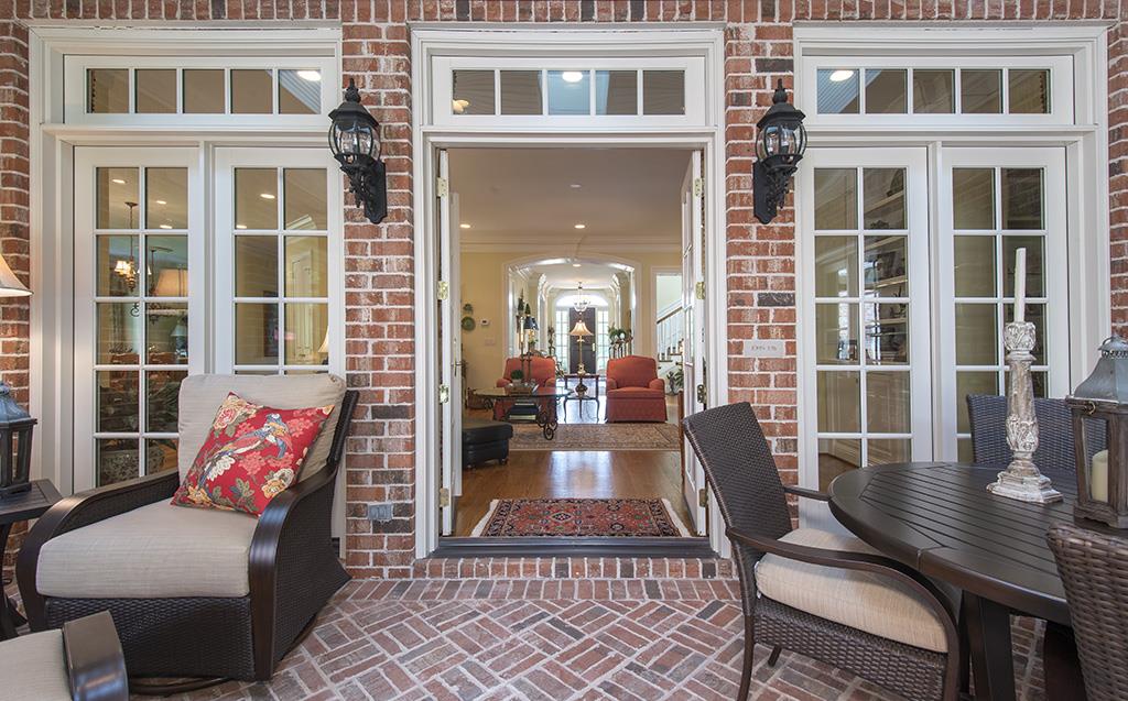 3610 Trimble Road Nashville, TN 37215 - Photo 28 of 29 Featuring Brick Floor, Bead Board Ceiling, Ceiling Fans & French Doors leading to Family Room
