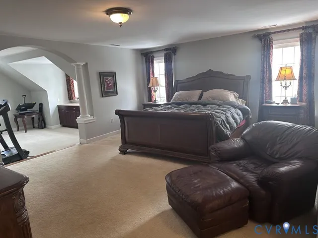 a bathroom with a tub a sink and a shower
